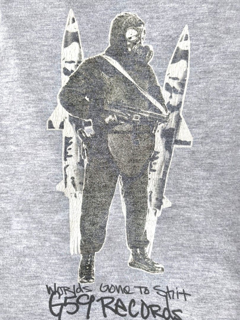 Grey five nine graphic tee (Category: Tshirts & Polo Shirts ) located in Tarlac. Submitted by thrifty_scavenger (Listing ID 1467871784, Image 2). Description: XXL on tag (29x23-23.5) issue: hairline cracks on print, minimal lints and light stain (lower part near hem) not your usual g59 merch. iykyk🔥.