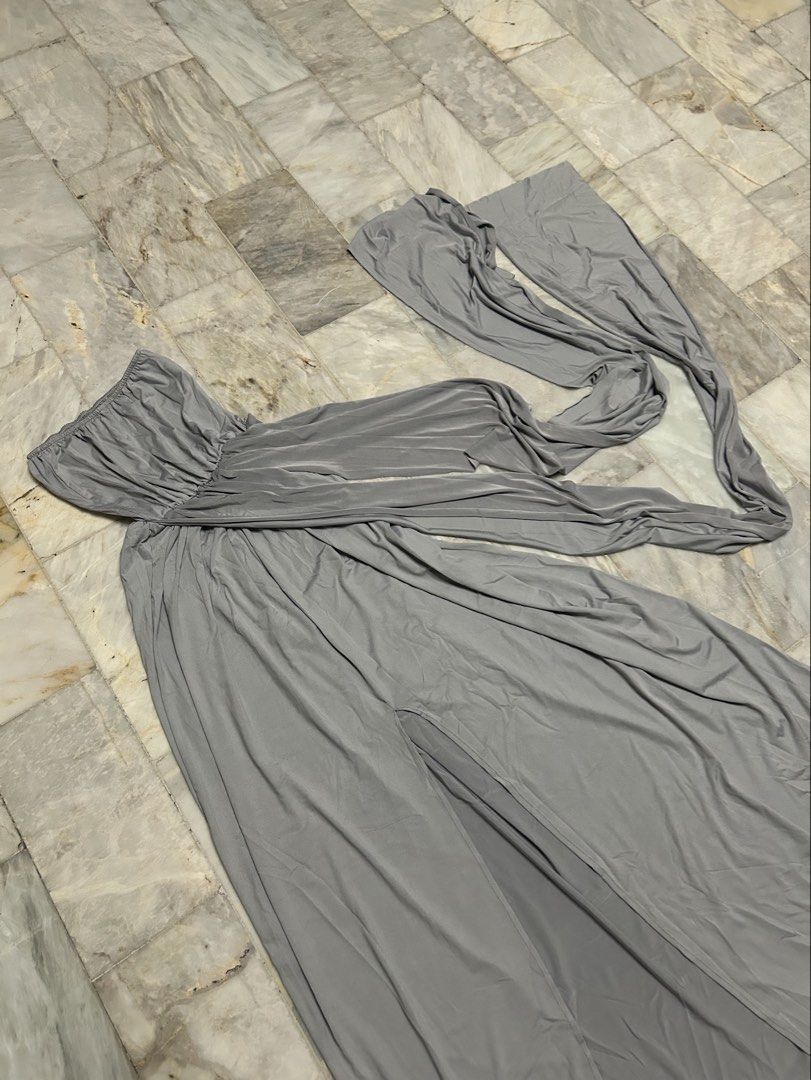 Grey Infinity Dress with custom slit (Category: Dresses) located in Paranaque City. Submitted by jeanfrommanila (Listing ID 1467960930, Image 2). Description: - Color: Grey - Size: Medium (fits US 6 / UK 10 / EU 38) - Style: Infinity dress (multi-way straps) - Special Feature: Custom front slit for easy movement and style - Perfect for: Weddings, debut parties, and formal occasions - Condition: worn once for a wedding Dimensions: (in inches) Bust