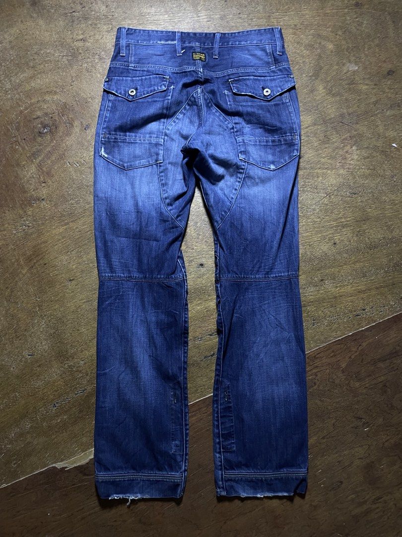 G-Star Raw 3301 Cargo Denim Jeans (Category: Jeans) located in Molave. Submitted by charlesthrifter (Listing ID 1467884296, Image 2). Description: - Brand: G-Star Raw 3301 - Type: Blue denim cargo jeans - Size: 30" waist / 34" length - Closure: Button fly - Pockets: Multiple cargo pockets on legs and back - Details: Articulated knee panels and distressed wash - Origin: Made in India - Style: Heavy utilitarian streetwear piece 34-35.