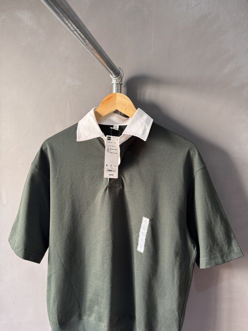 GU - Dark green Layer Polo Shirt (Category: Activewear) located in Cabuyao City. Submitted by _streetflavor (Listing ID 1467973096, Image 2). Description: GU - Dark green Layer Polo Shirt As new Size: small fits medium Boxi Length: 26 Width: 21 -650 pesos Dm.