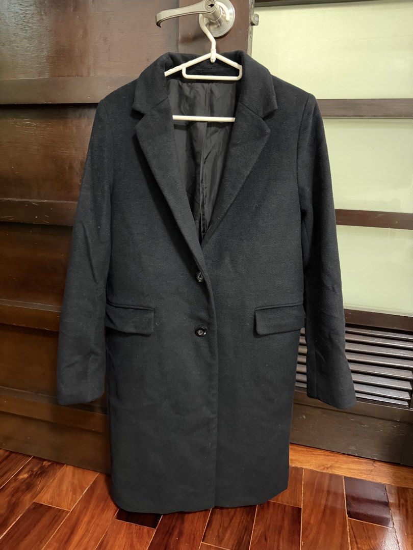 GU Black Wool Blend Long Coat Size M (Category: Coats, Jackets and Outerwear) located in Marikina City. Submitted by lucassantiano (Listing ID 1467864743, Image 1). Description: - Brand: GU - Style: Classic black long coat - Size: Medium (M) - Material: 65% polyester, 35% wool outer; 100% polyester lining - Features: Lapel collar, two front-button closure, flap pockets, fully lined - Condition: Good, needs a quick lint roll due to storage.
