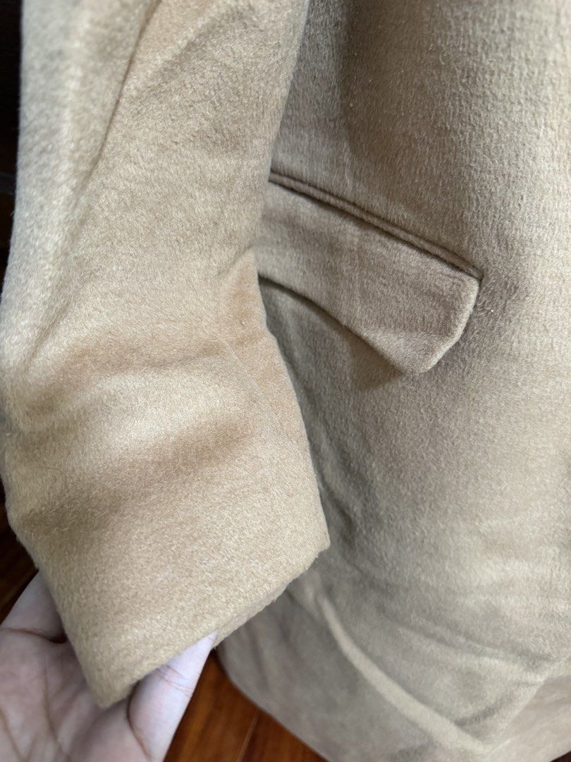 GU Camel Long Trench Wool Blend Coat Size S (Category: Coats, Jackets and Outerwear) located in Marikina City. Submitted by lucassantiano (Listing ID 1467864638, Image 2). Description: - Brand: GU - Style: Camel long coat - Size: S - Material: 67% polyester, 33% wool (fully lined with polyester) - Features: Front button closure, two front pockets - Condition: Clean overall, great warm layer for cold weather.