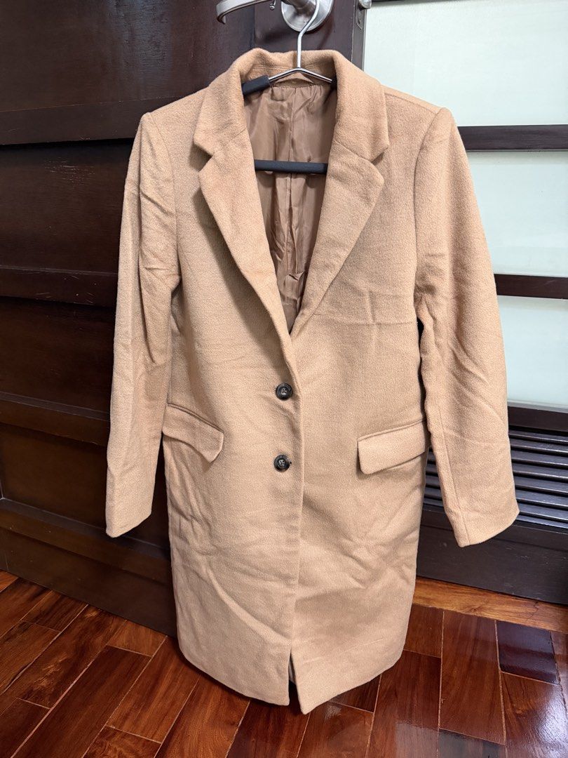GU Camel Long Trench Wool Blend Coat Size S (Category: Coats, Jackets and Outerwear) located in Marikina City. Submitted by lucassantiano (Listing ID 1467864638, Image 1). Description: - Brand: GU - Style: Camel long coat - Size: S - Material: 67% polyester, 33% wool (fully lined with polyester) - Features: Front button closure, two front pockets - Condition: Clean overall, great warm layer for cold weather.