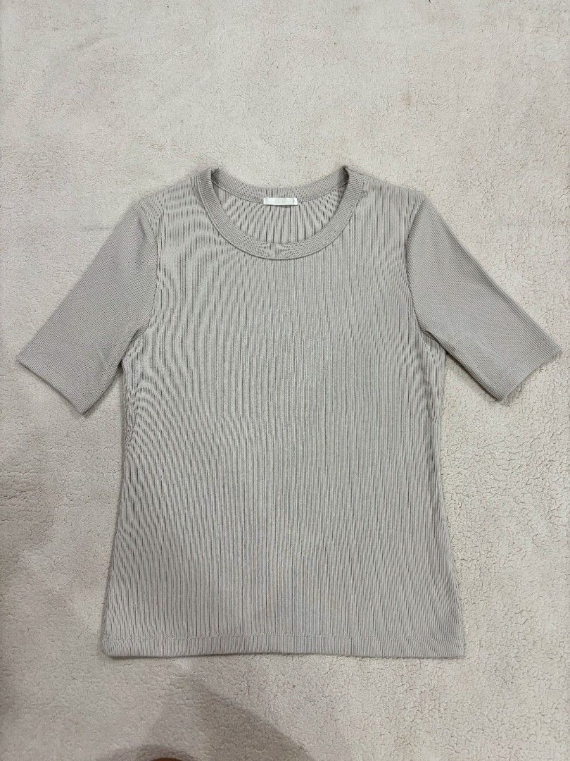 GU Ribbed Knit Short Sleeve Top Size (Category: Shirts) located in Cadiz. Submitted by soleil_montefalco (Listing ID 1467852836, Image 1). Description: - Brand: GU - Style: Ribbed knit top with crew neck and short sleeves - Color: Light Beige - Size: S (fits true to size) - Material: Cotton, polyester, and spandex blend (soft stretch) - excellent for daily wear - We may have failed to notice some minimal stains or flaws. - NO RUSH SHIPPING & MEET