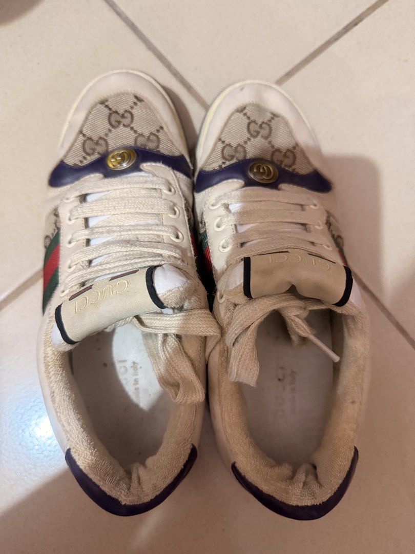 Gucci Ace GG Supreme Bee Sneakers (Category: Sneakers) located in Pasay City. Submitted by jamcoren1438417 (Listing ID 1467842384, Image 1). Description: - Authentic Gucci Ace low-top sneakers - Iconic GG Supreme canvas with signature green-red-green web stripe - Stylish purple leather trim and interlocking G hardware near toes - Classic lace-up fastening for a secure fit - Soles show standard wear with the iconic embossed bee motif clearly visib