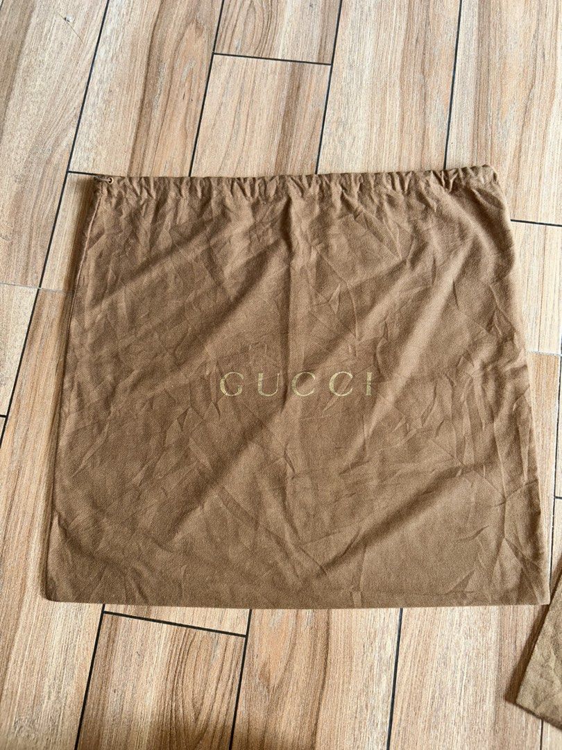 GUCCI BUNDLE DUST BAG (Category: Purses & Pouches) located in General Santos City (Dadiangas). Submitted by grasya_12 (Listing ID 1467953618, Image 2). Description: BUNDLE DUST BAG - Indicated sa pic yong sizes - normal signs of usage .