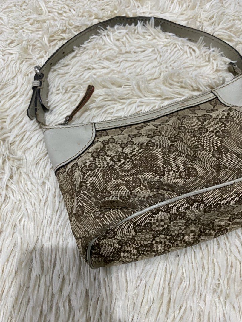 Gucci GG Monogram Canvas PROJECT BAG (Category: Shoulder Bags) located in Manila. Submitted by switchcity (Listing ID 1467877725, Image 2). Description: - Authentic Gucci shoulder bag in classic brown monogram canvas - Chic white leather trim details on the corners - Matching adjustable shoulder strap for comfortable wear - Secure top zipper closure with a sleek leather pull - Compact size, ideal for your everyday essentials - Message us for more