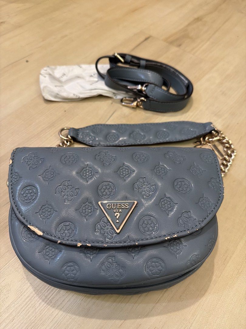 Guess bag with chain and strap (new) (Category: Shoulder Bags) located in Manila. Submitted by _____car0usell (Listing ID 1467986705, Image 2). Description: bought from US never used, just stuck in the closet straps are removable depending on your style still with original stuffing papers see noticeable flaking due to storage.