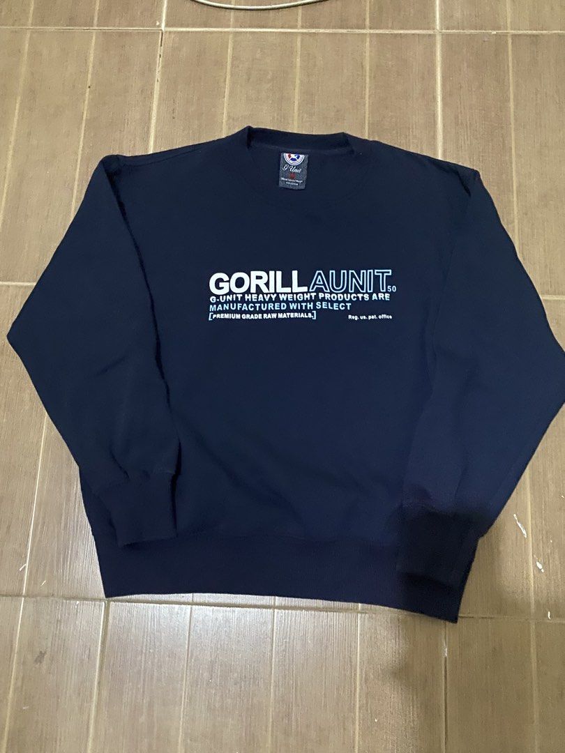 G-Unit GorillAunit Heavyweight Navy Sweatshirt Size M (Category: Coats, Jackets and Outerwear) located in Bacoor. Submitted by jabbawantkiss (Listing ID 1467993485, Image 1). Description: - Brand: G-Unit - Color: Navy Blue - Size: Medium - Design: Bold "GORILLA UNIT" text graphic on front - Material: 100% heavyweight cotton - Measurements: 22 inches pit to pit, 26 inches length - Features: Classic ribbed cuffs and hem.