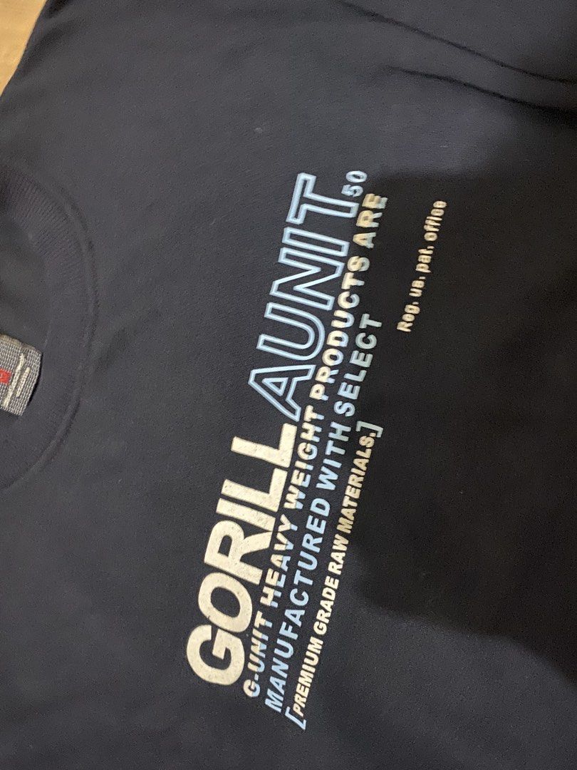 G-Unit GorillAunit Heavyweight Navy Sweatshirt Size M (Category: Coats, Jackets and Outerwear) located in Bacoor. Submitted by jabbawantkiss (Listing ID 1467993485, Image 3). Description: - Brand: G-Unit - Color: Navy Blue - Size: Medium - Design: Bold "GORILLA UNIT" text graphic on front - Material: 100% heavyweight cotton - Measurements: 22 inches pit to pit, 26 inches length - Features: Classic ribbed cuffs and hem.