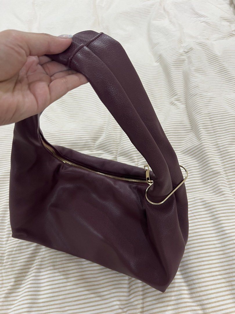 GVN Medium Hobo Bag in Oxblood (Category: Shoulder Bags) located in Santa Rosa. Submitted by herprel0ved (Listing ID 1467983672, Image 3). Description: - bought last Aug/Sep 2024 - No leather peeling and tarnished hardware - Pristine condition RFS: i barely use it.