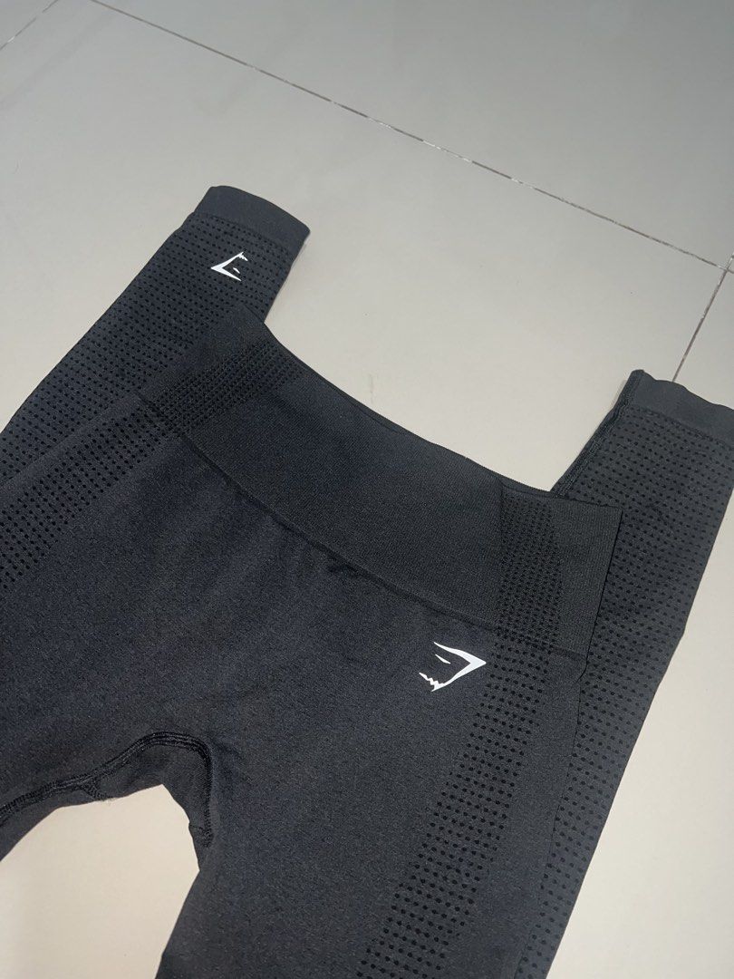 Gymshark Black Seamless Leggings (Category: Activewear) located in Pasig City. Submitted by epitome.ph (Listing ID 1467935977, Image 1). Description: - Authentic Gymshark black seamless leggings - High-waisted design with a supportive ribbed waistband - Contour dot detailing for enhanced breathability and shape - Iconic white Gymshark logo on the hip and lower ankle - Ultra-stretchy, breathable fabric perfect for the gym or everyday lounging - Be