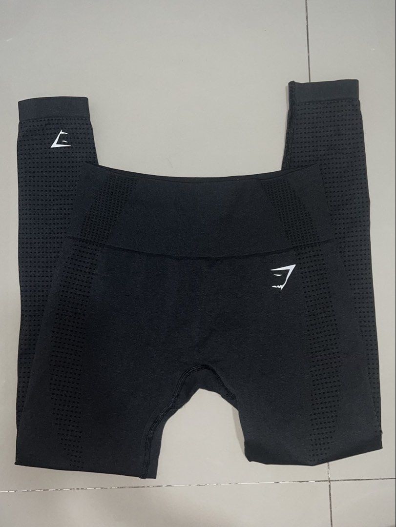 Gymshark Black Seamless Leggings (Category: Activewear) located in Pasig City. Submitted by epitome.ph (Listing ID 1467935977, Image 3). Description: - Authentic Gymshark black seamless leggings - High-waisted design with a supportive ribbed waistband - Contour dot detailing for enhanced breathability and shape - Iconic white Gymshark logo on the hip and lower ankle - Ultra-stretchy, breathable fabric perfect for the gym or everyday lounging - Be
