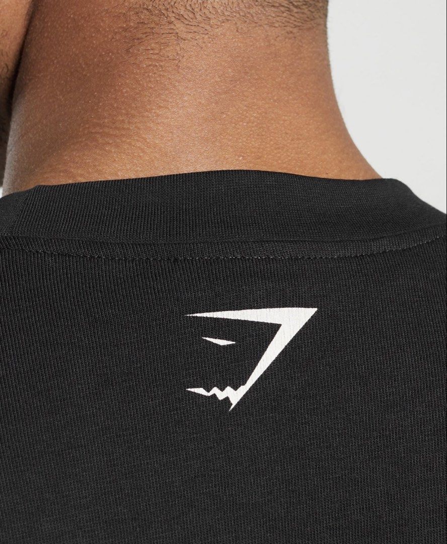GYMSHARK Collegiate Shirt (Category: Activewear) located in Bayombong. Submitted by rethreadsactivewear (Listing ID 1467850440, Image 3). Description: ON-HAND! READY TO SHIP! 🔥 GYMSHARK Collegiate Shirt Large Brandnew with pouch 1799 only! GRAPHIC IMAGES Versatile fits & authentic lifting graphics. Step up your staples with our graphic styles. • Make a statement with a bold graphic • Premium, soft heavyweight fabric • Perfect for in or out of th