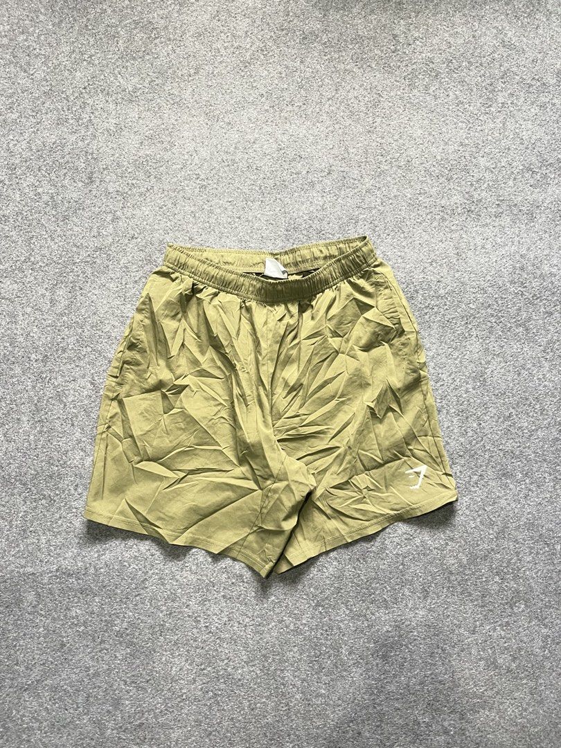 Gymshark short (Category: Shorts) located in Lapu Lapu. Submitted by jhonrener41426 (Listing ID 1467915936, Image 2). Description: Small Size 28/32 stretchable Length-16 Leg opening-11.5 Excellent condition Color rate 9.8/10 Authentic Olive .