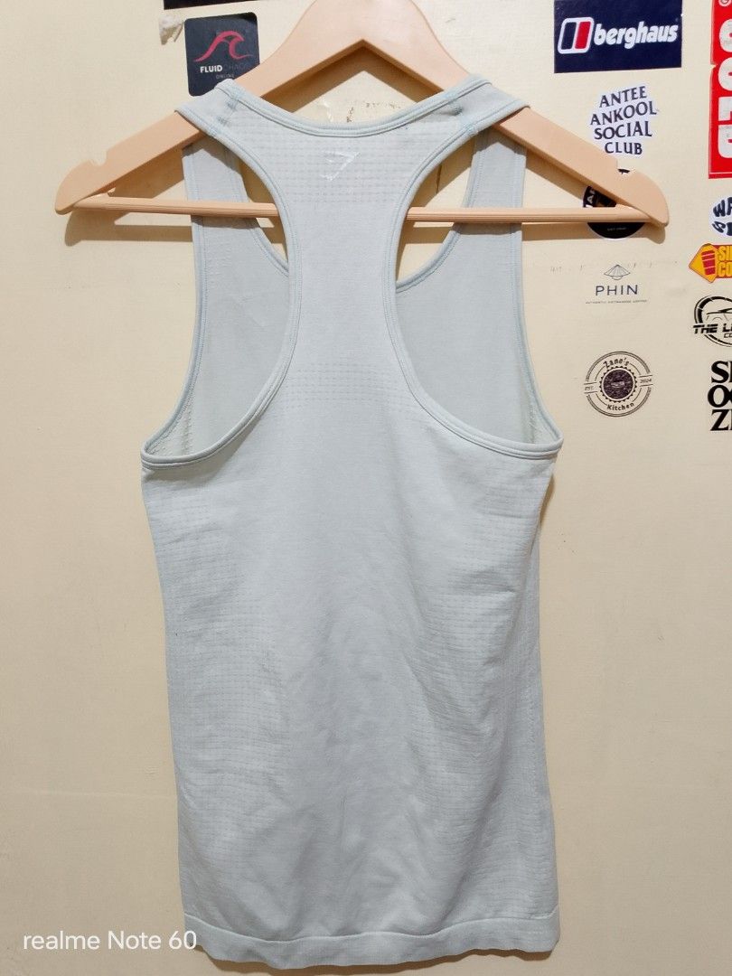 Gymshark Vital seamless tank (Category: Activewear) located in Tagum. Submitted by tgm2023 (Listing ID 1468058793, Image 3). Description: Gymshark Vital seamless tank verygood condition width 13 length 25 size XS on tag crack print ang logo sa likod seamless construction ✅ lightweight and breathable ✅ stretchable fabric ✅ quickdry ✅ 250.⁰⁰.