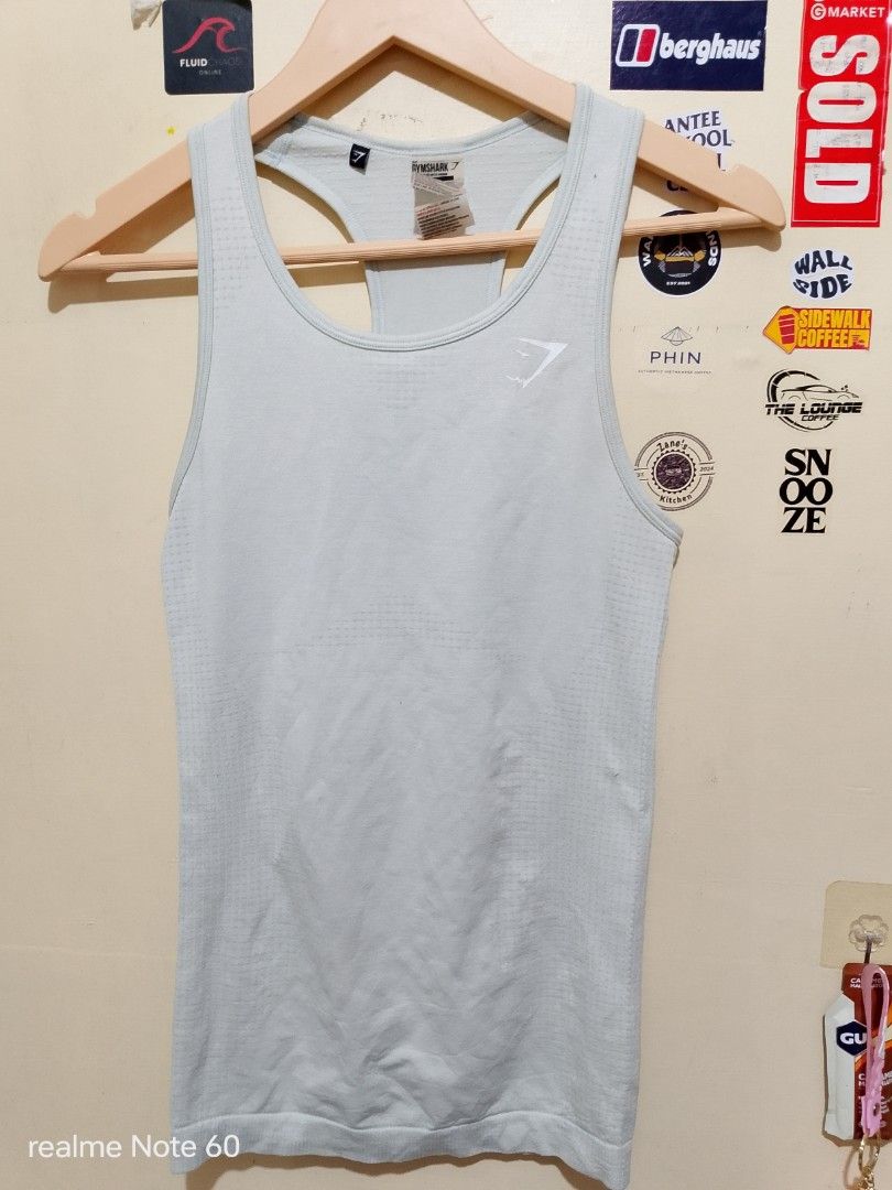 Gymshark Vital seamless tank (Category: Activewear) located in Tagum. Submitted by tgm2023 (Listing ID 1468058793, Image 2). Description: Gymshark Vital seamless tank verygood condition width 13 length 25 size XS on tag crack print ang logo sa likod seamless construction ✅ lightweight and breathable ✅ stretchable fabric ✅ quickdry ✅ 250.⁰⁰.