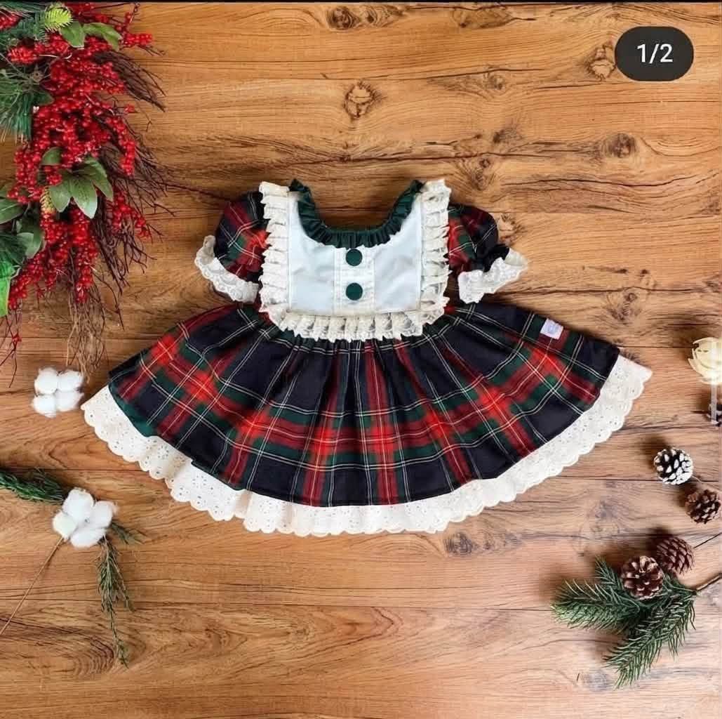 Hailey Christmas dress S2 (Category: Babies & Kids Fashion) located in Taguig. Submitted by aj030 (Listing ID 1467965611, Image 1). Description: - Festive tartan plaid holiday dress in classic red, green, and black - Adorable white bib collar with delicate white lace edging - Cute short puff sleeves and ruffled dark green neckline with buttons - Charming layered white eyelet lace hem - Perfect holiday outfit for toddlers -Size medium Can fit 1-3 