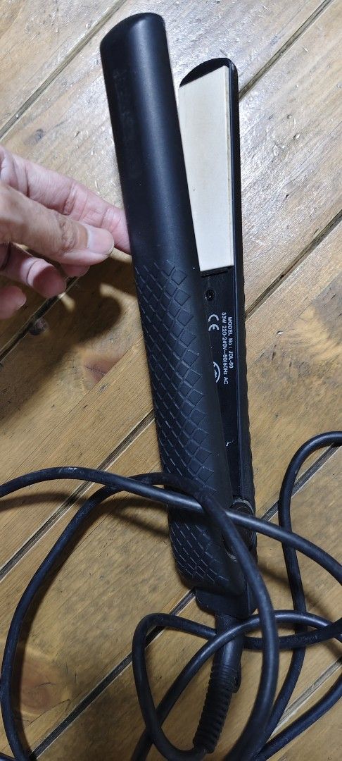 Hair Straightener JDL-50 33W (Category: Hair) located in Mandaluyong City. Submitted by rsha31 (Listing ID 1467882220, Image 1). Description: - Model: JDL-50 (CE Certified) - Power: 33W, 220-240V - Color/Design: Sleek black with a textured diamond pattern grip - Plates: White ceramic heating plates for smooth styling - Cord: Durable, thick black power cord included - Condition: Brand new and ready to use.