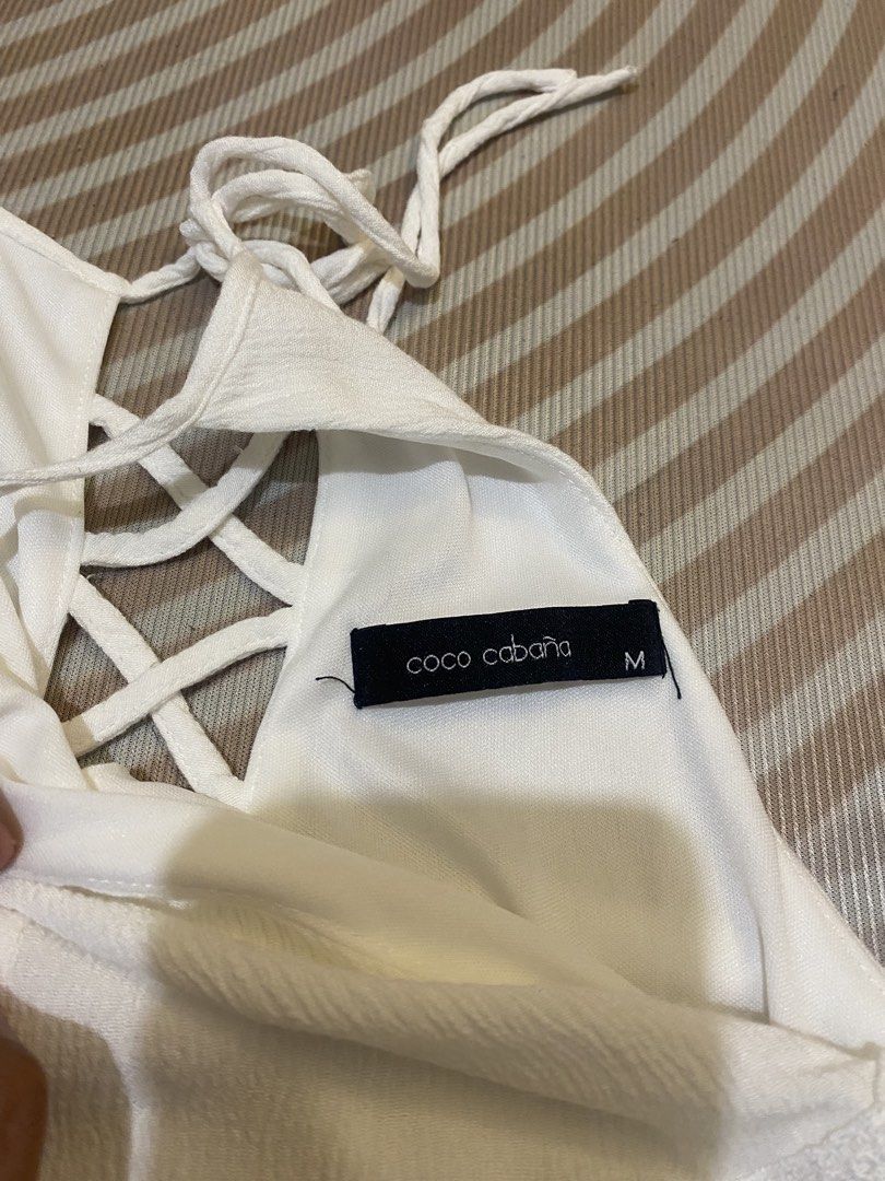 Halter Mini Dress (Category: Dresses) located in Quezon City. Submitted by jmxyz (Listing ID 1467974299, Image 2). Description: - brand: coco cabana - size: medium - see last photo for when worn ‼️moving out sale 📍greenfield, mandaluyong.