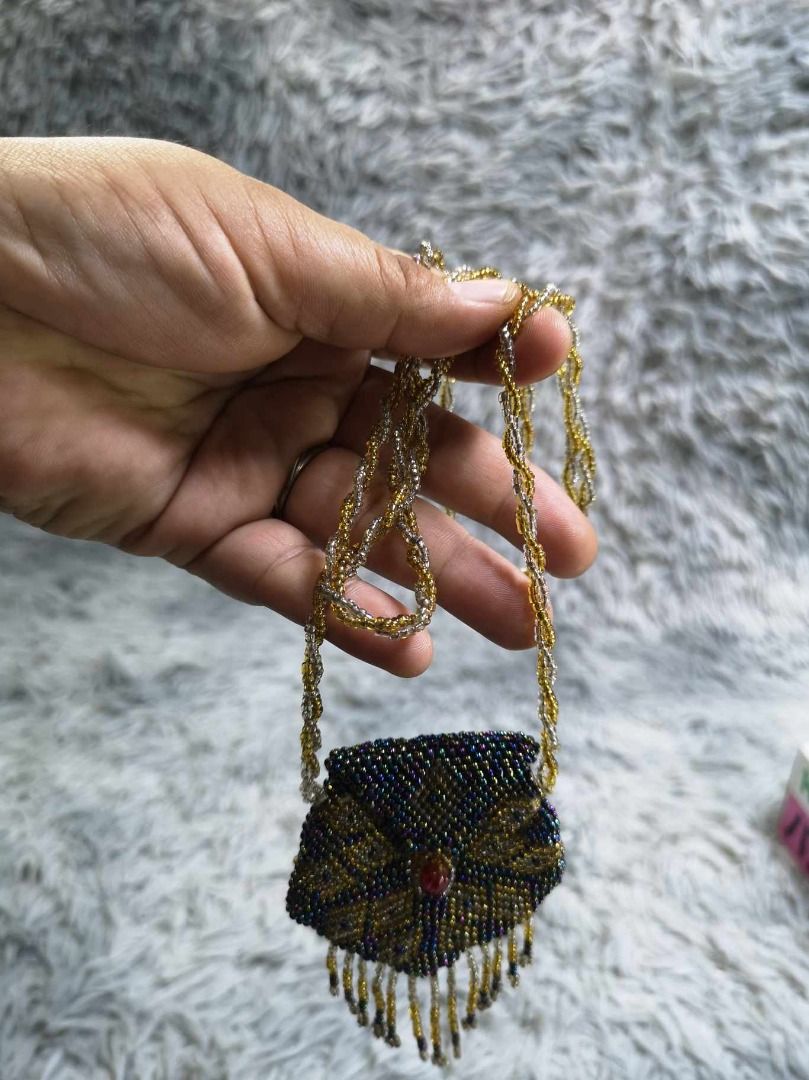Handcrafted Beaded Pendant Necklace (Category: Necklaces) located in Santa Cruz. Submitted by jmy_surplus.2 (Listing ID 1467911204, Image 2). Description: Size ; L - 19 W - 2.4 Color ; Blue , Yellow Type ; Necklace Brand ; No Brand Material ; Pearl Style ; Cute & Durable Beaded necklace LG 117 JMY 3 Batch #225.