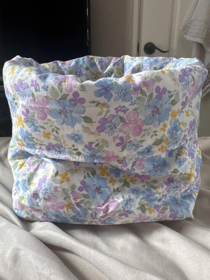 Handmade Large Storage Basket Bin (Category: Storage Boxes & Baskets) located in Makati City. Submitted by shaniahdeclutters (Listing ID 1467857336, Image 1). Description: - Soft fabric storage basket with a charming blue, purple, and yellow floral pattern - Crisp white background with clean interior and exterior - Features collapsible sides for easy storage when not in use - Perfect for organizing makeup, toiletries, or small desk and shelf item