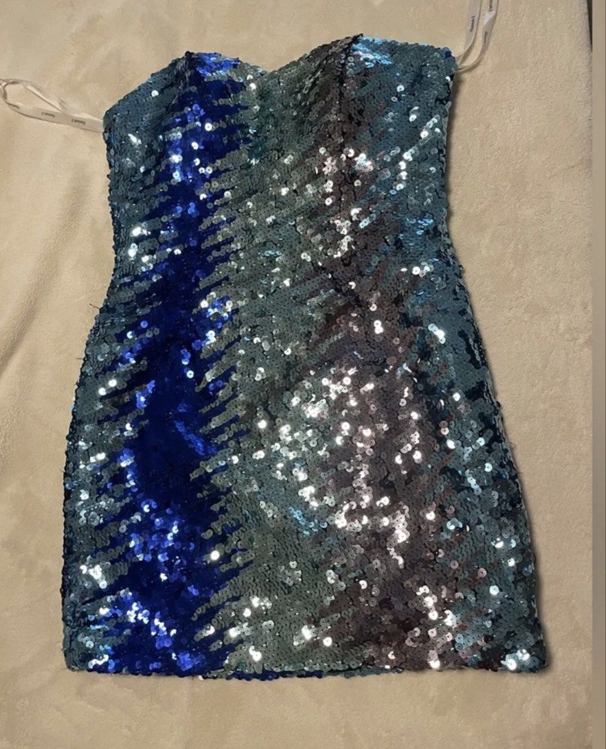 Hannah S Sequin Strapless Mini Dress (Category: Evening dresses & gowns) located in Cabuyao City. Submitted by airpz (Listing ID 1467993603, Image 2). Description: - Brand/Style: Hannah S, Style #27805 - Design: Fully covered in blue and multi-tone sequins - Neckline: Sweetheart neckline with built-in structured support - Fit: Bodycon, hitting at mid-thigh - Extras: Includes hanging straps attached inside the lining - Occasion: Ideal for parties,
