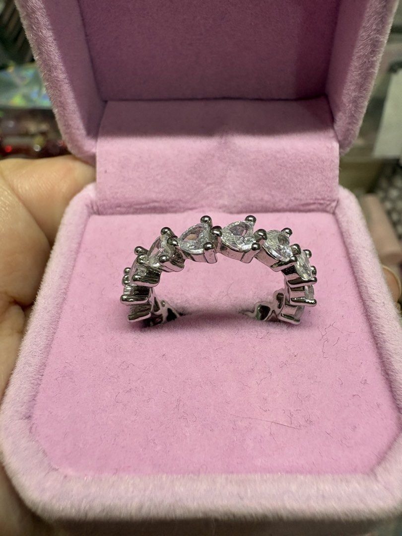 Heart-shaped rhinestone eternity ring in titanium (Category: Rings) located in Manila. Submitted by alyannaros79007 (Listing ID 1467980663, Image 3). Description: - Design: Sparkling heart-shaped clear crystals in a silver-tone prong setting (titanium base) - Style: Full eternity band that catches the light brilliantly - Fit: Comfortable on the finger - Size: 9.