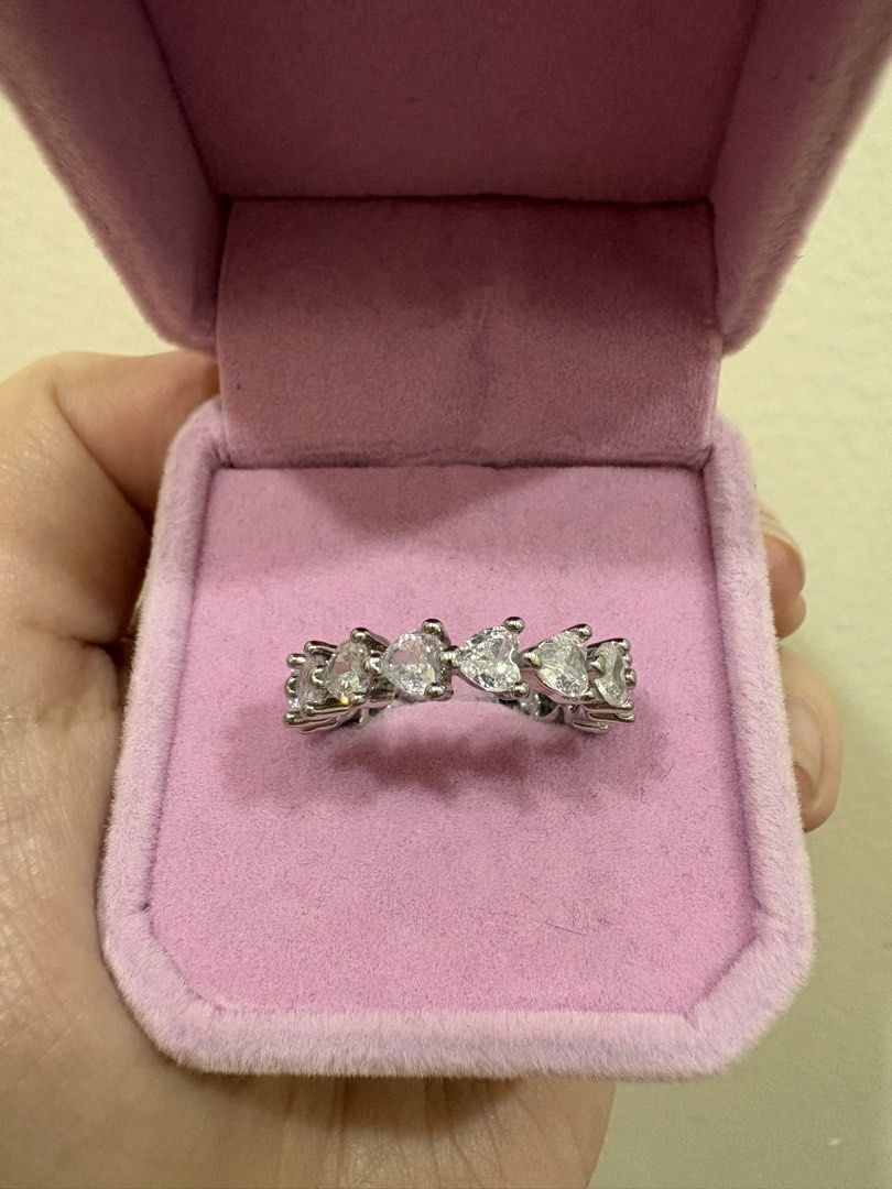 Heart-shaped rhinestone eternity ring in titanium (Category: Rings) located in Manila. Submitted by alyannaros79007 (Listing ID 1467980663, Image 1). Description: - Design: Sparkling heart-shaped clear crystals in a silver-tone prong setting (titanium base) - Style: Full eternity band that catches the light brilliantly - Fit: Comfortable on the finger - Size: 9.