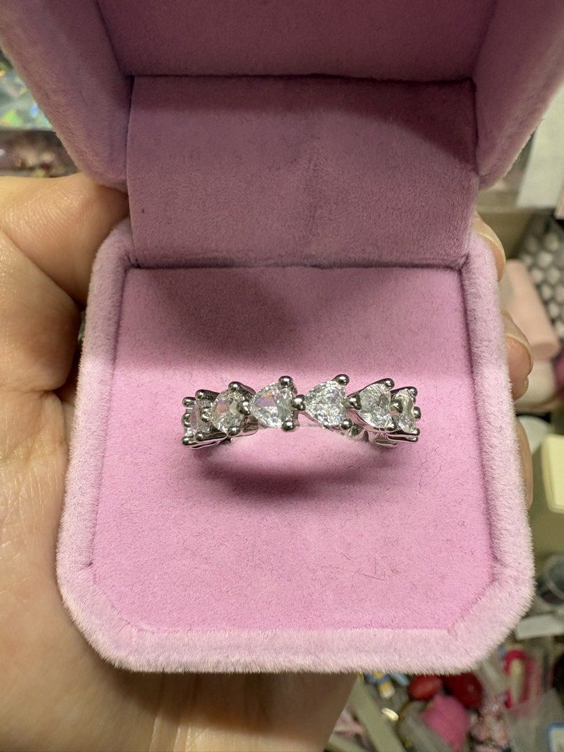 Heart-shaped rhinestone eternity ring in titanium (Category: Rings) located in Manila. Submitted by alyannaros79007 (Listing ID 1467980663, Image 2). Description: - Design: Sparkling heart-shaped clear crystals in a silver-tone prong setting (titanium base) - Style: Full eternity band that catches the light brilliantly - Fit: Comfortable on the finger - Size: 9.
