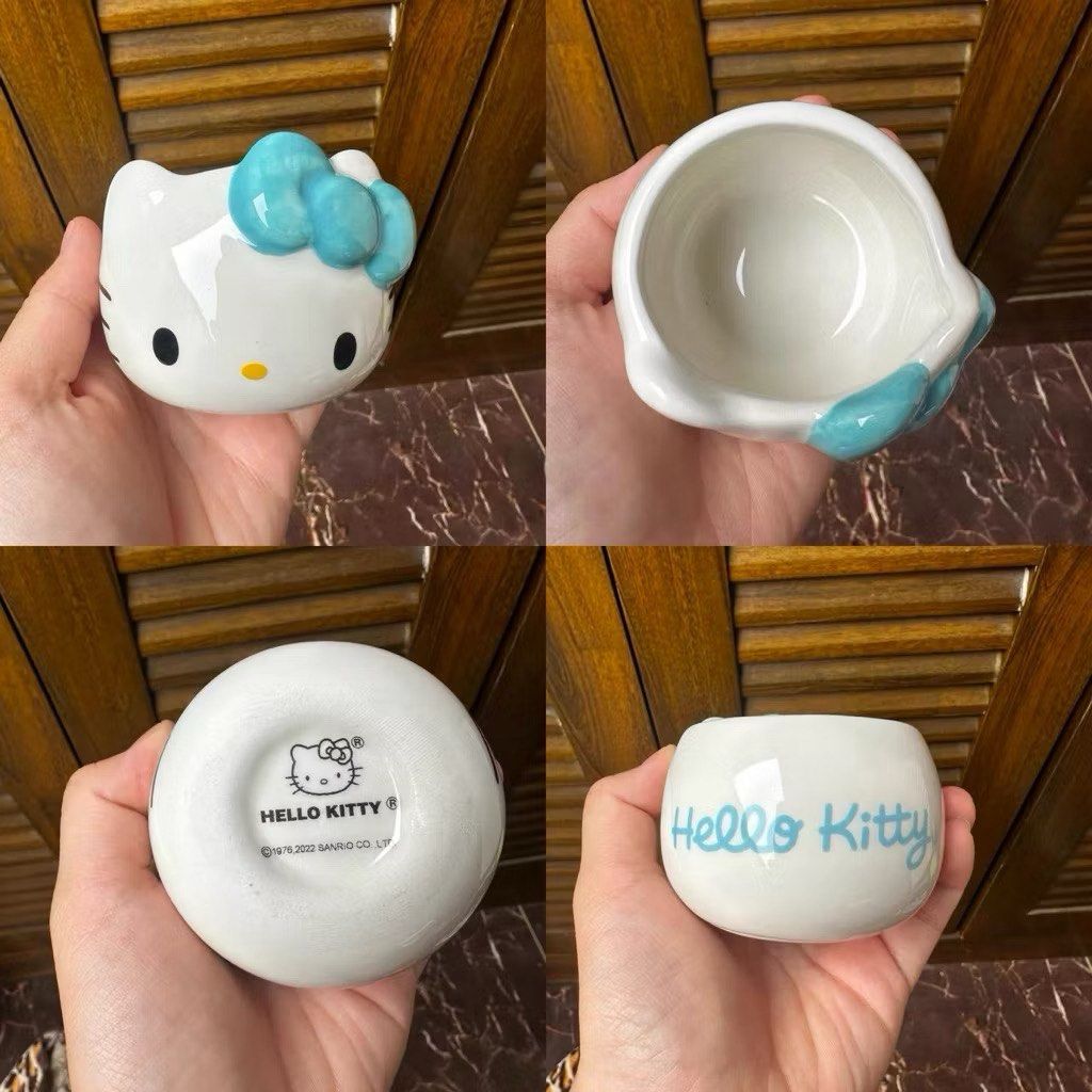Hello Kitty Ceramic Cup Sanrio Character Mug (Category: Coffee & Tea Tableware) located in Manila. Submitted by janetecson05 (Listing ID 1467844379, Image 2). Description: - Official Sanrio merchandise (2022 release) - Design features cute colourful bows in pink, red, purple, and blue - Versatile size great for coffee, tea, or snacks - Smooth ceramic finish makes it quick and easy to wash - Perfect addition to any Kitty or Sanrio collection.