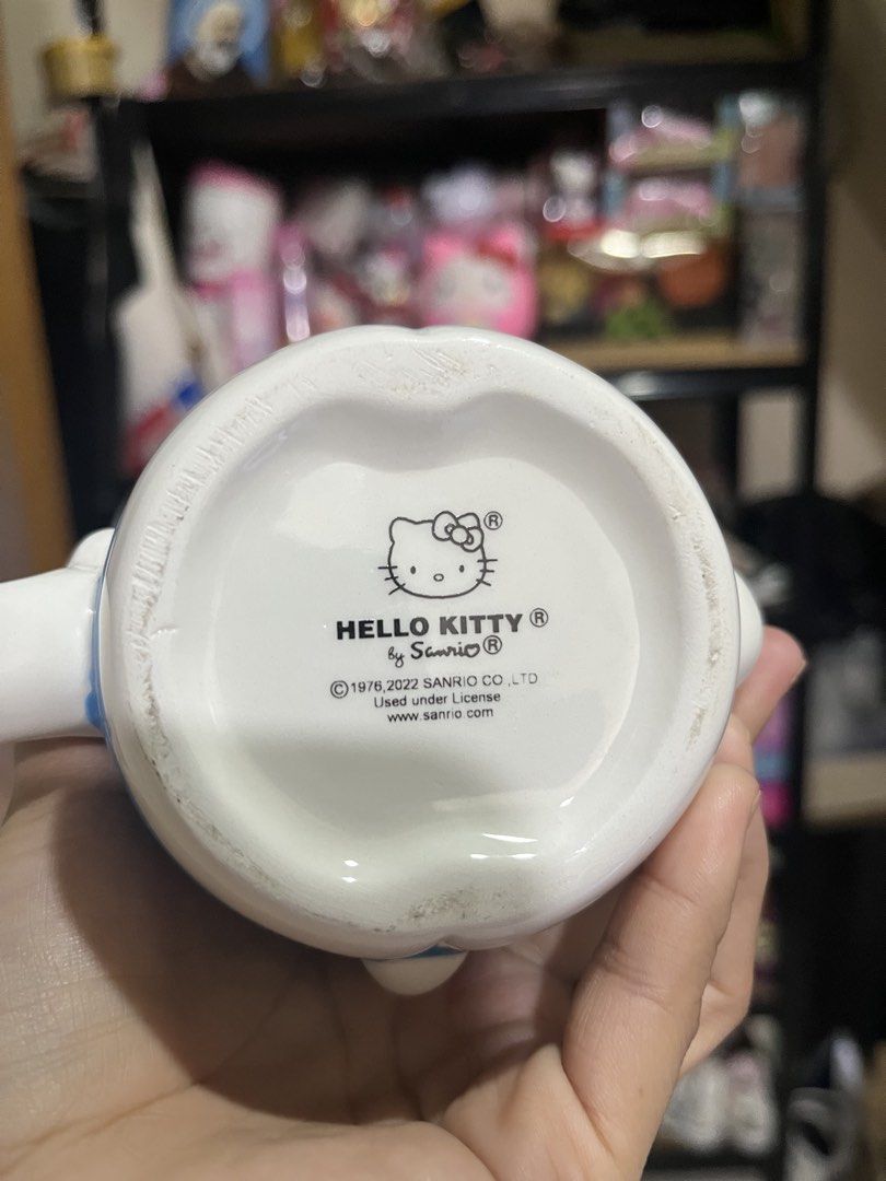 Hello Kitty Ceramic Cup Sanrio Character Mug (Category: Coffee & Tea Tableware) located in Manila. Submitted by janetecson05 (Listing ID 1467844379, Image 3). Description: - Official Sanrio merchandise (2022 release) - Design features cute colourful bows in pink, red, purple, and blue - Versatile size great for coffee, tea, or snacks - Smooth ceramic finish makes it quick and easy to wash - Perfect addition to any Kitty or Sanrio collection.