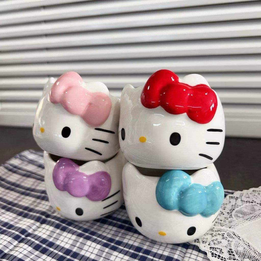 Hello Kitty Ceramic Cup Sanrio Character Mug (Category: Coffee & Tea Tableware) located in Manila. Submitted by janetecson05 (Listing ID 1467844379, Image 1). Description: - Official Sanrio merchandise (2022 release) - Design features cute colourful bows in pink, red, purple, and blue - Versatile size great for coffee, tea, or snacks - Smooth ceramic finish makes it quick and easy to wash - Perfect addition to any Kitty or Sanrio collection.