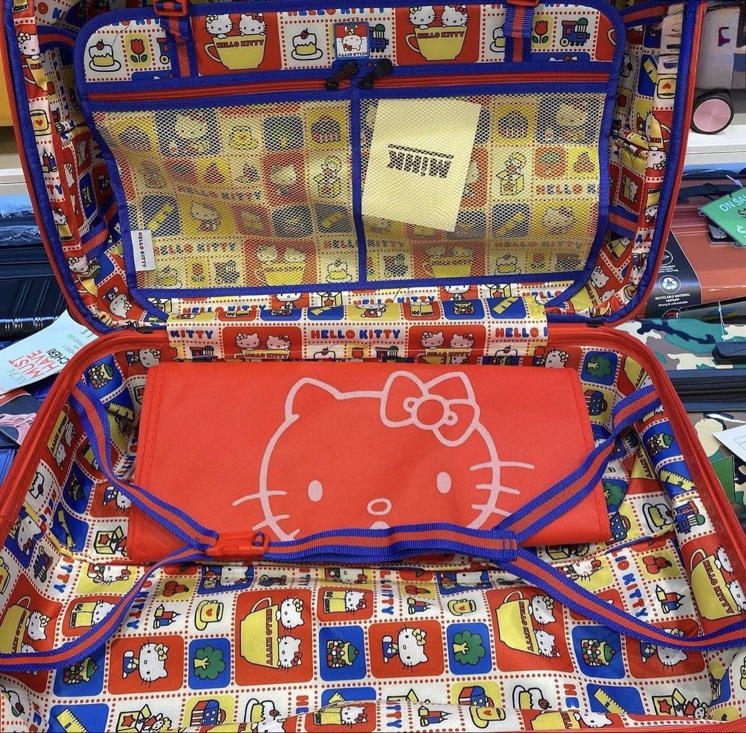 Hello Kitty Red carry on luggage 20” (Category: Luggage) located in Pasig City. Submitted by maxine888 (Listing ID 1468050487, Image 3). Description: Hello kitty red carry on luggage 20” Used well 4k Hong kong exclusive - Vibrant red Kitty hardside suitcase hardware - Built-in TSA007 combination lock (currently set to 000) - Cute black zipper pulls with iconic bow shape and Kitty branding - Durable textured shell material - Ideal for travel use o