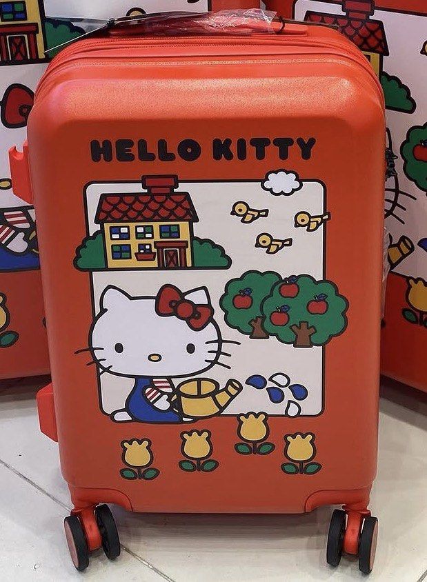 Hello Kitty Red carry on luggage 20” (Category: Luggage) located in Pasig City. Submitted by maxine888 (Listing ID 1468050487, Image 2). Description: Hello kitty red carry on luggage 20” Used well 4k Hong kong exclusive - Vibrant red Kitty hardside suitcase hardware - Built-in TSA007 combination lock (currently set to 000) - Cute black zipper pulls with iconic bow shape and Kitty branding - Durable textured shell material - Ideal for travel use o