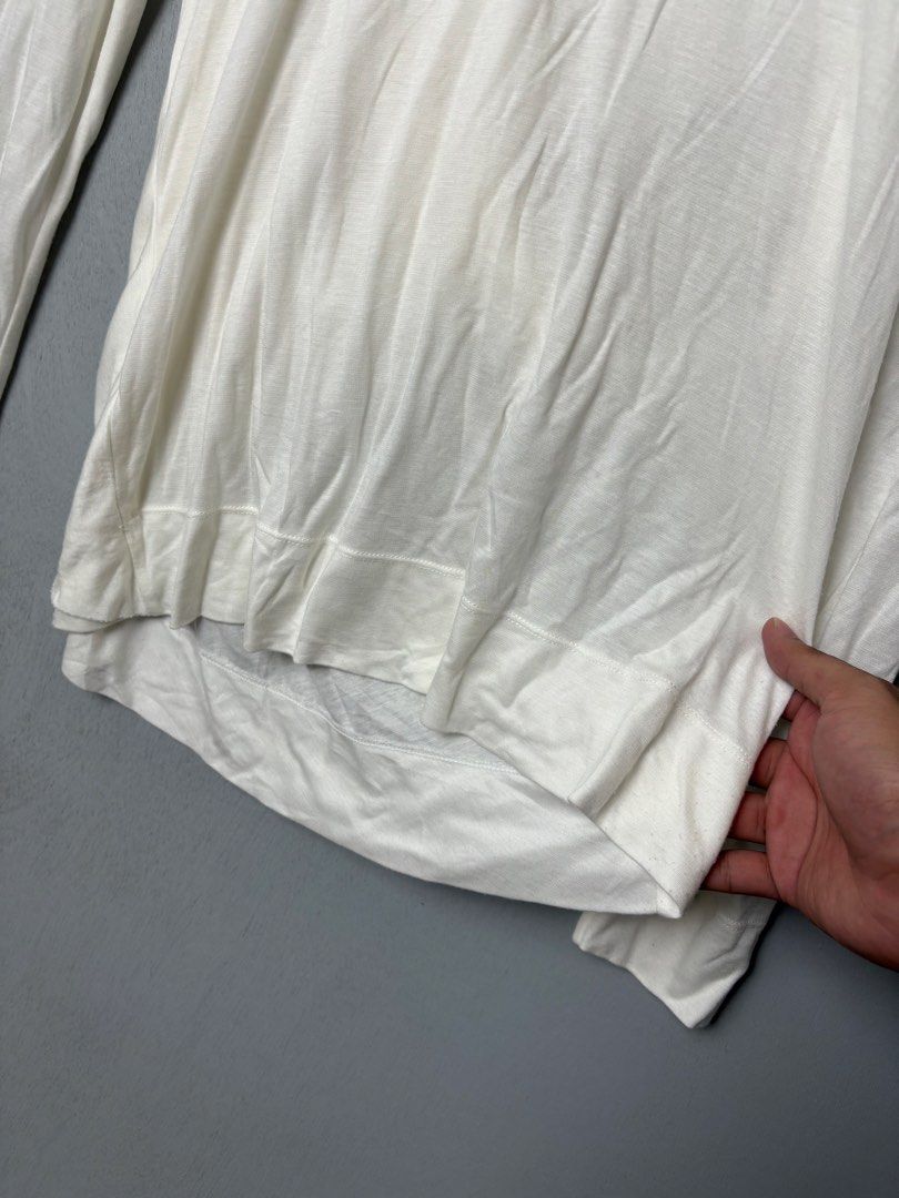 Helmut Lang Open Twist-Back Long Sleeve Top (Category: Longsleeves) located in Mandaluyong City. Submitted by fellas_ph (Listing ID 1467961996, Image 3). Description: Excellent condition No issues Size S 19" Width 26" Length.