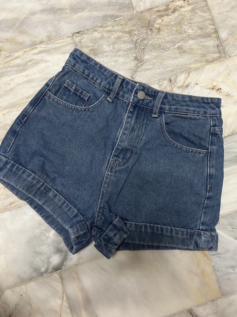 High-Waisted Denim Shorts Clean Cut (Category: Shorts) located in Paranaque City. Submitted by jeanfrommanila (Listing ID 1467955690, Image 1). Description: - Wash: Dark blue, dark wash denim - Fit & Closure: Classic five-pocket design with button closure, working zipper - Details: Features functional back patch pockets - Worn 2x only cause I got fat Dimes: (in inches) Waist: 26 Length: 12.