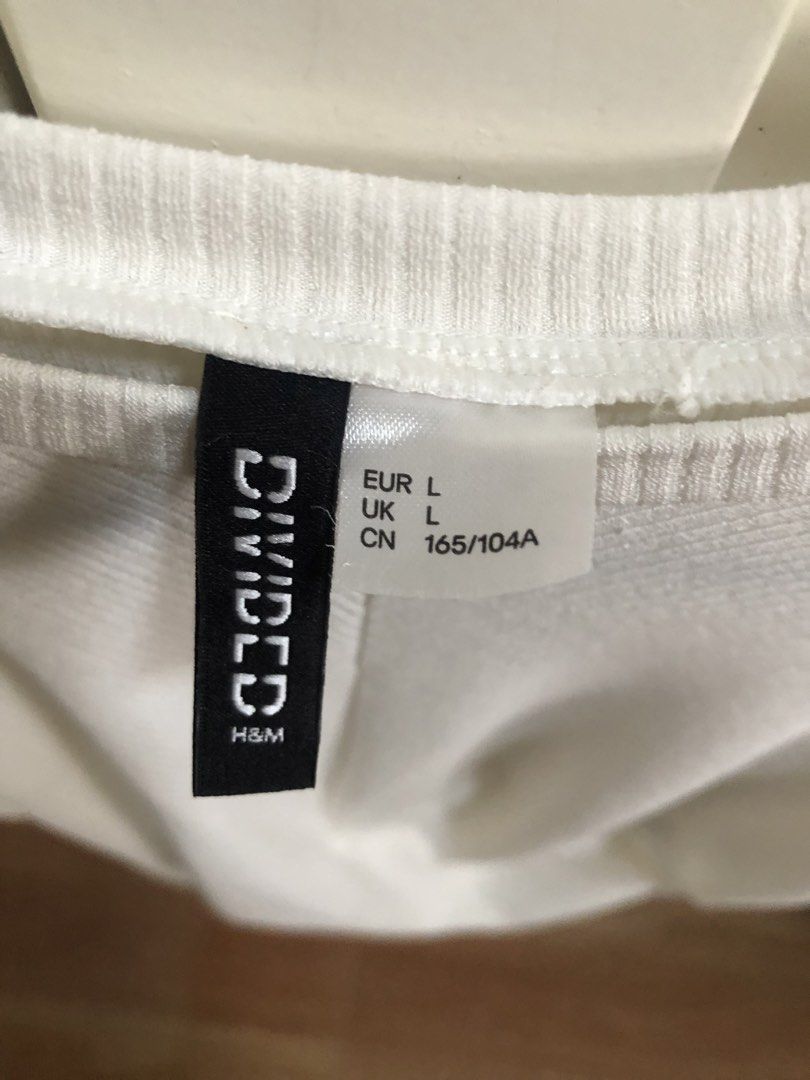 H&M Divided White Ribbed Crop Top with Twist Front (Category: Shirts) located in Tigaon. Submitted by closetbyp (Listing ID 1468056755, Image 2). Description: Message for a when-worn photo..
