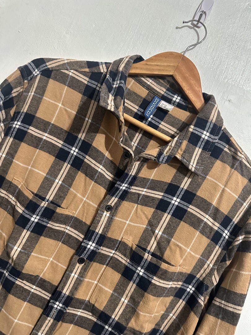 H&M Flannel Shirt (Category: Formal Shirts) located in Bulacan. Submitted by zerowastewardrobe (Listing ID 1467963204, Image 3). Description: Dimensions : W23 x L29 in Size on tag: L Colors may vary due to lighting and photography. **Please read*** For mailing & delivery only. No Pick Up No COD Courier is J&T Express or Lalamove (same day deliver). Shipping fee is shouldered by buyer. Return & refund policy: Please video your unboxing of your par
