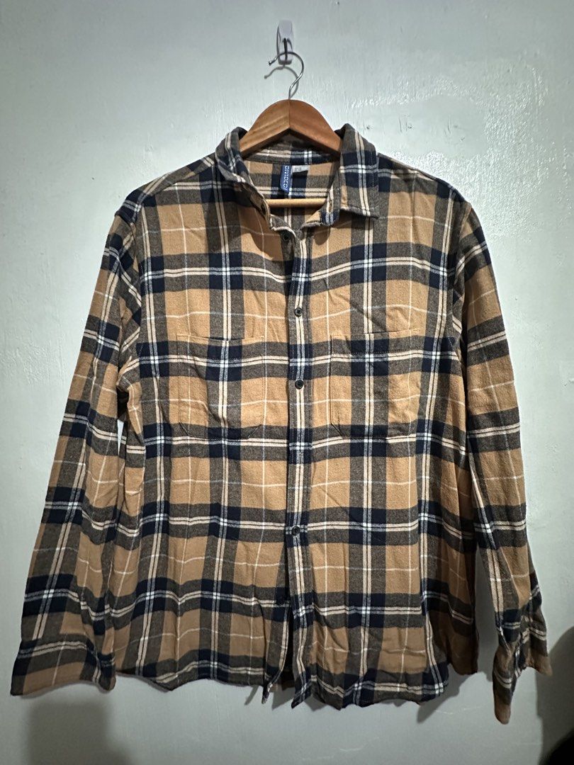 H&M Flannel Shirt (Category: Formal Shirts) located in Bulacan. Submitted by zerowastewardrobe (Listing ID 1467963204, Image 1). Description: Dimensions : W23 x L29 in Size on tag: L Colors may vary due to lighting and photography. **Please read*** For mailing & delivery only. No Pick Up No COD Courier is J&T Express or Lalamove (same day deliver). Shipping fee is shouldered by buyer. Return & refund policy: Please video your unboxing of your par