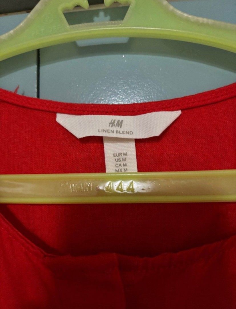 H&M Linen Blend Red Dress Size M (Category: Maternity wear) located in Bulacan. Submitted by clo.ra (Listing ID 1467903364, Image 2). Description: - Brand: H&M - Color: Bright Red - Size: Medium (Regular fit) runs Big can fit up to Large - Material: Comfortable and breathable linen blend - Features: Long sleeves with gathered cuffs, button-front closure, cinched waistline - Condition: Excellent, no flaws noticed - Best for: Warm weather and casua