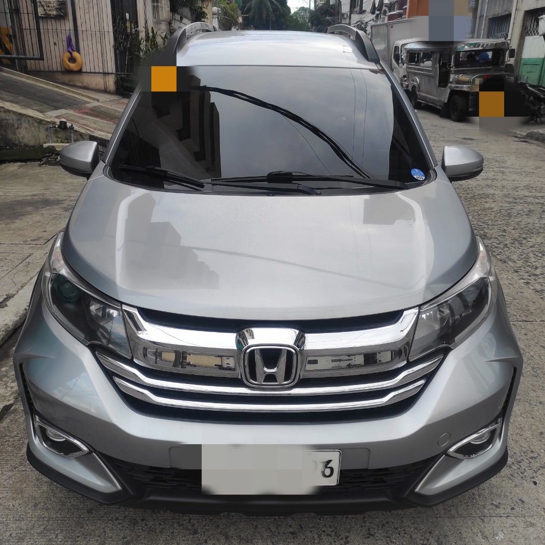 Honda BR-V (Category: Used Cars) located in Quezon City. Submitted by mjp918557503 (Listing ID 1467950706, Image 1). Description: FOR SALE: 2021 Honda BR-V 1.5 S CVT Price: ₱658,000 (Negotiable upon viewing) Location: Sta Mesa Heights, QC Overview: - 31,000 km - CASA Maintained - 4 New Tires - New Front Brake Pads & Rear Brake Drums - Replaced CV Boot (OEM replacement) - New Headlight Bulbs - Full Leather Seat Covers + Leather Steering Wheel Cove