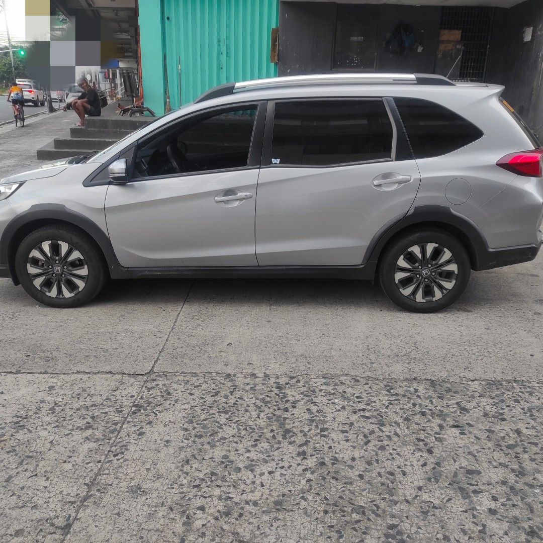 Honda BR-V (Category: Used Cars) located in Quezon City. Submitted by mjp918557503 (Listing ID 1467950706, Image 3). Description: FOR SALE: 2021 Honda BR-V 1.5 S CVT Price: ₱658,000 (Negotiable upon viewing) Location: Sta Mesa Heights, QC Overview: - 31,000 km - CASA Maintained - 4 New Tires - New Front Brake Pads & Rear Brake Drums - Replaced CV Boot (OEM replacement) - New Headlight Bulbs - Full Leather Seat Covers + Leather Steering Wheel Cove