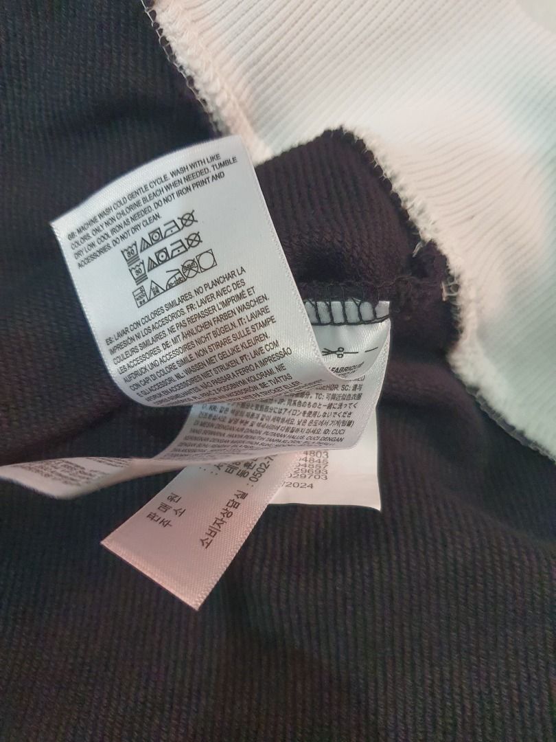 Hoodie (Category: Activewear) located in Caloocan City. Submitted by cleverwind_1e53ab (Listing ID 1467870587, Image 3). Description: - Brand: Vans x mr sabotage - Color: Black - Size: Extra Large (XL) - Design: Rib cage graphic on front, skeleton arms on sleeves, and bone lettering on shoulders - Details: Neck drawstrings and metal D-ring near the collar - Origin: Made in China.