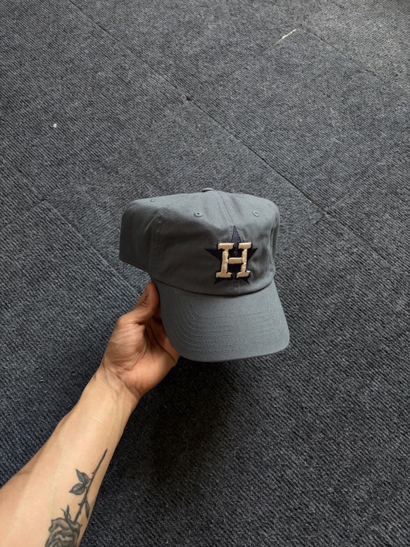 Houston Astros MLB Baseball Cap Grey (Category: Caps & Hats) located in Manila. Submitted by toys_hats005 (Listing ID 1467958565, Image 1). Description: - Authentic Houston Astros grey baseball cap - Embroidered team logo on the front - Adjustable strapback with a brass buckle for a custom fit - Official MLB merchandise hologram sticker inside - Clean interior lining with Team Classic tags - Perfect for everyday wear and baseball fans.