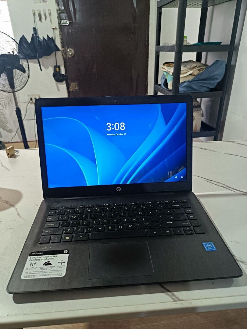 HP Stream Laptop Intel Celeron 4GB RAM Windows 11 (Category: Laptops & Notebooks) located in Valenzuela. Submitted by ichicadangan01 (Listing ID 1467988470, Image 1). Description: HP Stream laptop running Windows 11 Home. Powered by an Intel Celeron N4000 processor at 1.10GHz. Includes 4GB of installed RAM. Black chassis with the HP logo on the lid and palm rest sticker intact. Screen turns on normally. Great portable machine for everyday school 