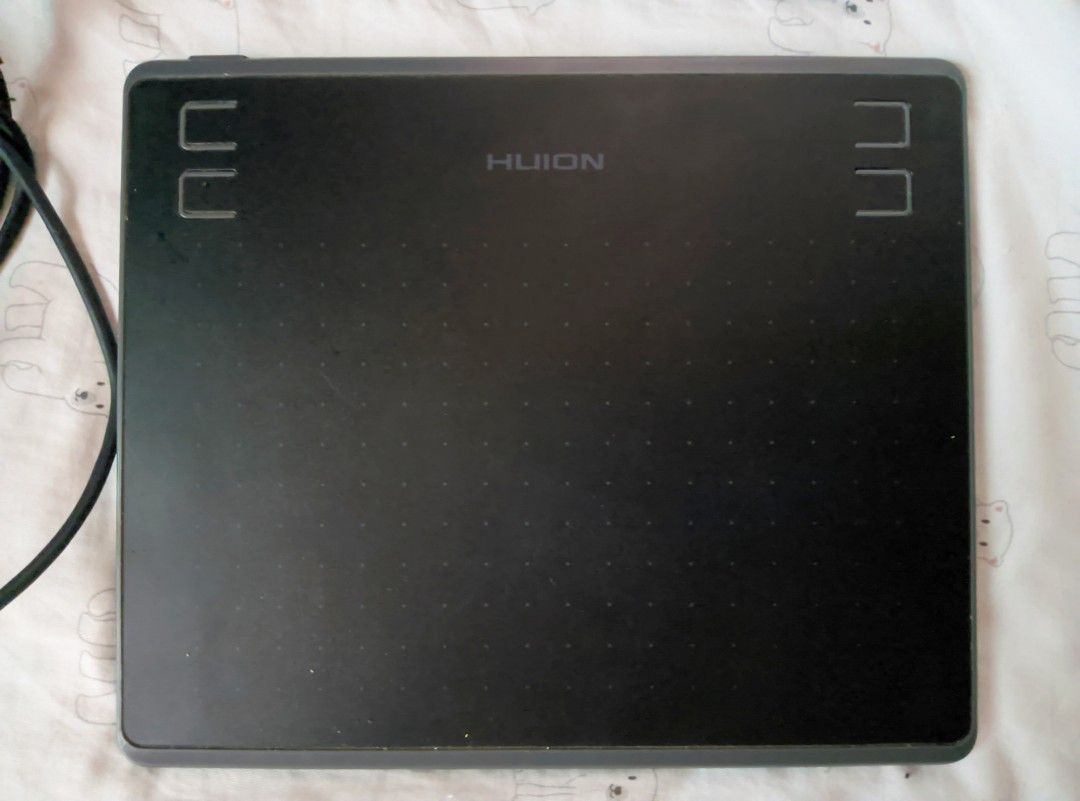 Huion HS64 Graphics Drawing Tablet with Pen and Cable (Category: Art & Prints) located in Butuan. Submitted by kkkai.zzzzz (Listing ID 1467851209, Image 2). Description: - Huion HS64 Drawing Tablet - Original Price: P1750 - Inclusions: Stylus pen and USB cable - Has few scratches on the tablet. Stylus tip may need replacement but still useable - Perfect for beginner digital artists and osu players.