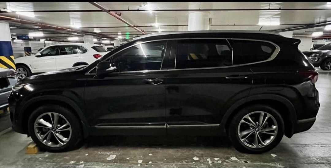 Hyundai Santa Fe 2.4 (A) (Category: Used Cars) located in Quezon City. Submitted by safeflower.a95850 (Listing ID 1467864158, Image 2). Description: FOR SALE: 2019 Hyundai Santa Fe SUV – Only 19,000 km! Looking for a nearly-new SUV without the brand-new price tag? This 2019 Hyundai Santa Fe has been driven just 19,000 km, and it’s in perfect condition: no issues, no repairs needed, ready to drive home today. Highlights • 2019 model, only 19,000 k