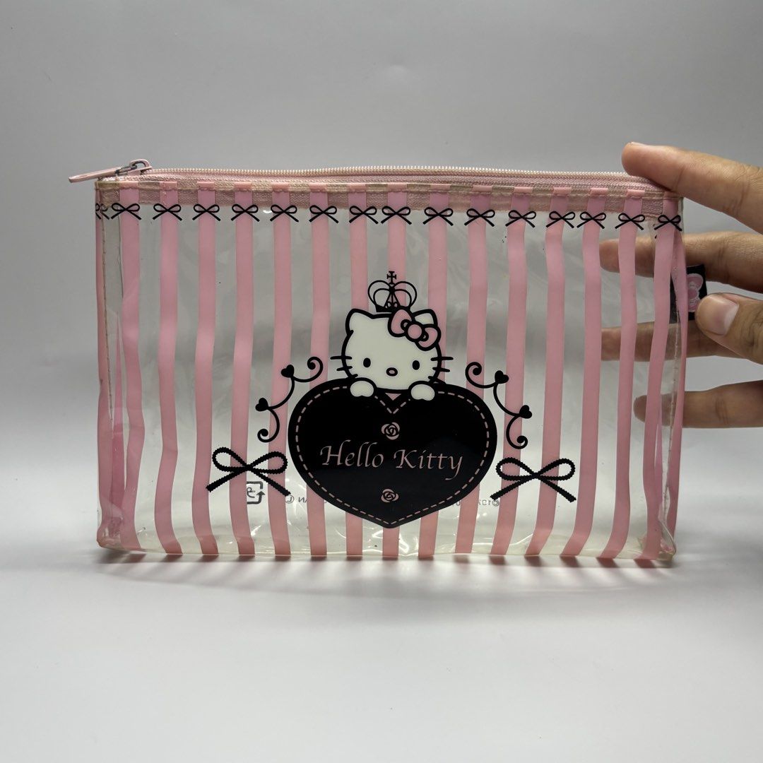 Impression Vanity Sanrio Hello Kitty Slim Clear Pouch (Category: Character Goods) located in General Trias. Submitted by shxx_phine (Listing ID 1467845739, Image 1). Description: 📌LP posted, PLS refrain from haggling 📌 all items are japan surplus finds 📌 STRICTLY mine now, pay after invoice 📌 NO RUSH shipping (we ship every tues & fri, depending on our availability) 📌 NO cancellation, return and refunds mod | j&t, lalamove mop | gcash , mari