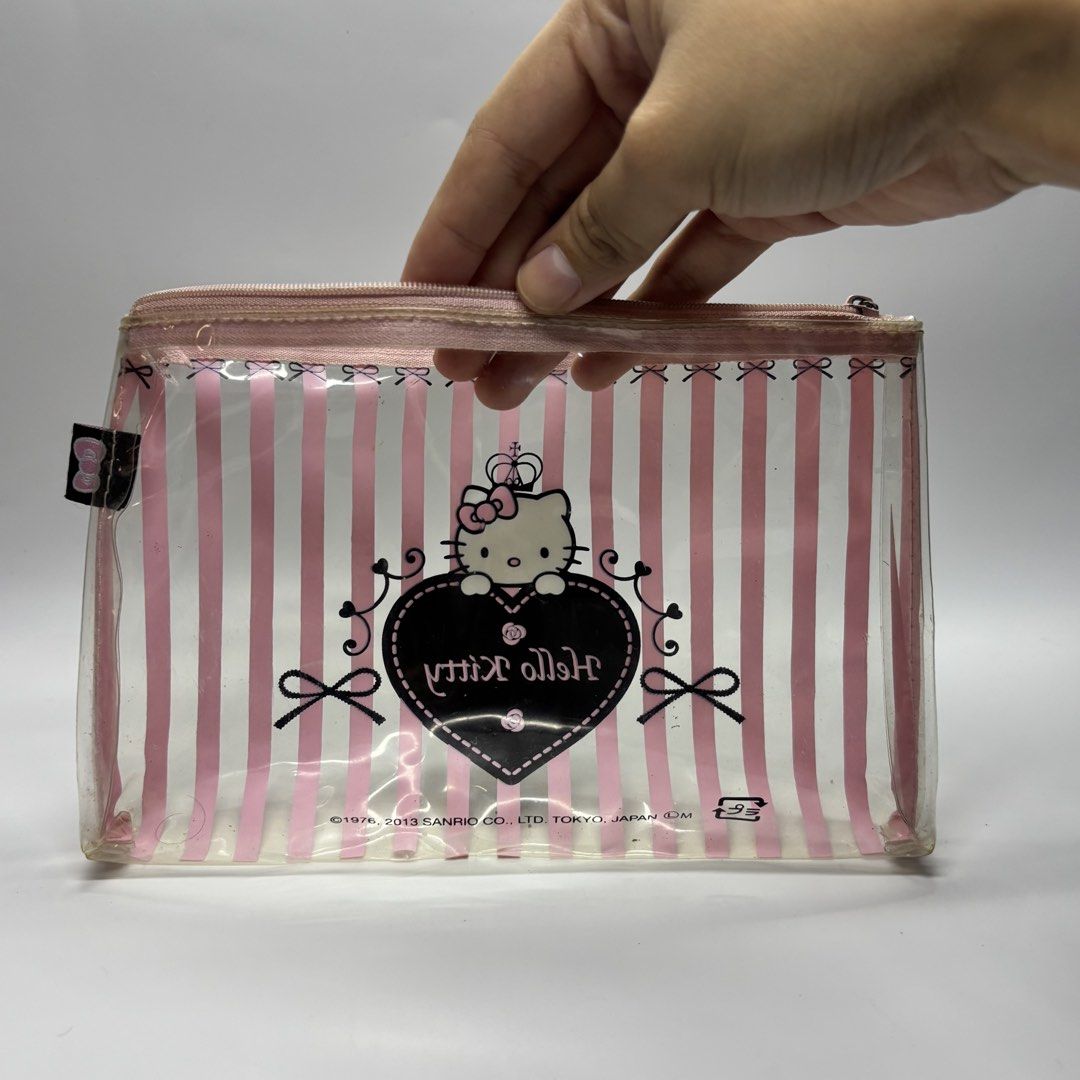 Impression Vanity Sanrio Hello Kitty Slim Clear Pouch (Category: Character Goods) located in General Trias. Submitted by shxx_phine (Listing ID 1467845739, Image 2). Description: 📌LP posted, PLS refrain from haggling 📌 all items are japan surplus finds 📌 STRICTLY mine now, pay after invoice 📌 NO RUSH shipping (we ship every tues & fri, depending on our availability) 📌 NO cancellation, return and refunds mod | j&t, lalamove mop | gcash , mari